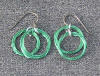 green niobium coil hypoallergenic earrings with titanium earwires