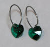 titanium sleeper earrings with emerald swarovski hearts
