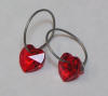 Titanium sleeper earrings with Ruby swarovski hearts