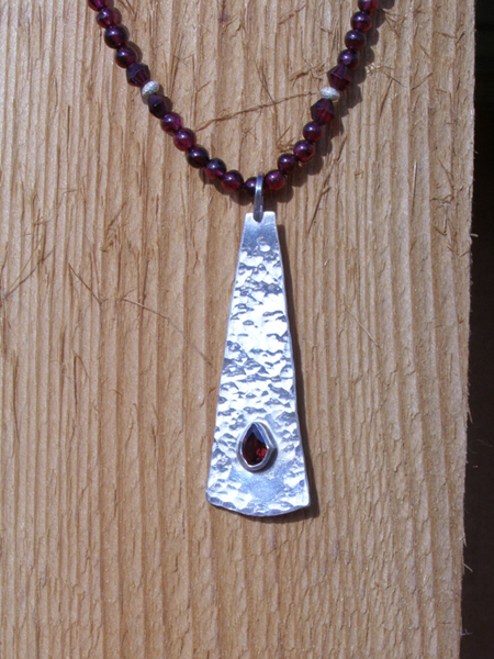 designer faceted garnet necklace