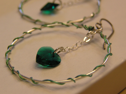 hypoallergenic hoop earrings with emerald swarovski heart crystals