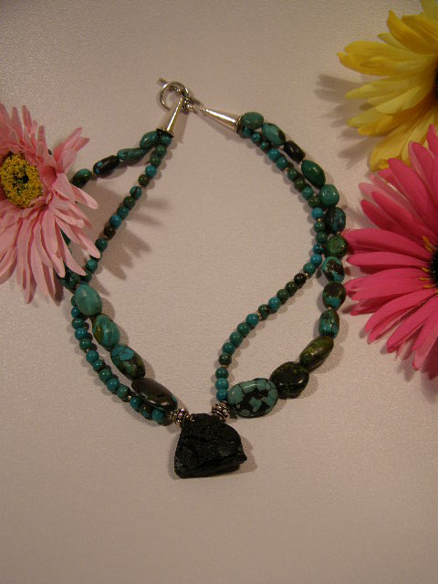 designer turquoise and tecktite necklace