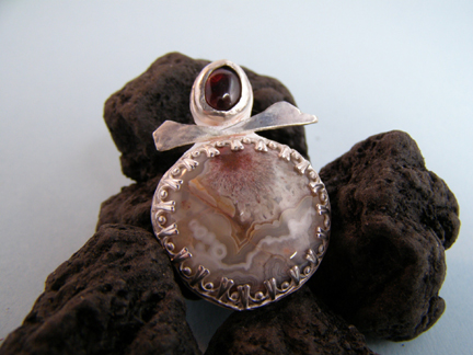 designer garnet lace pendant